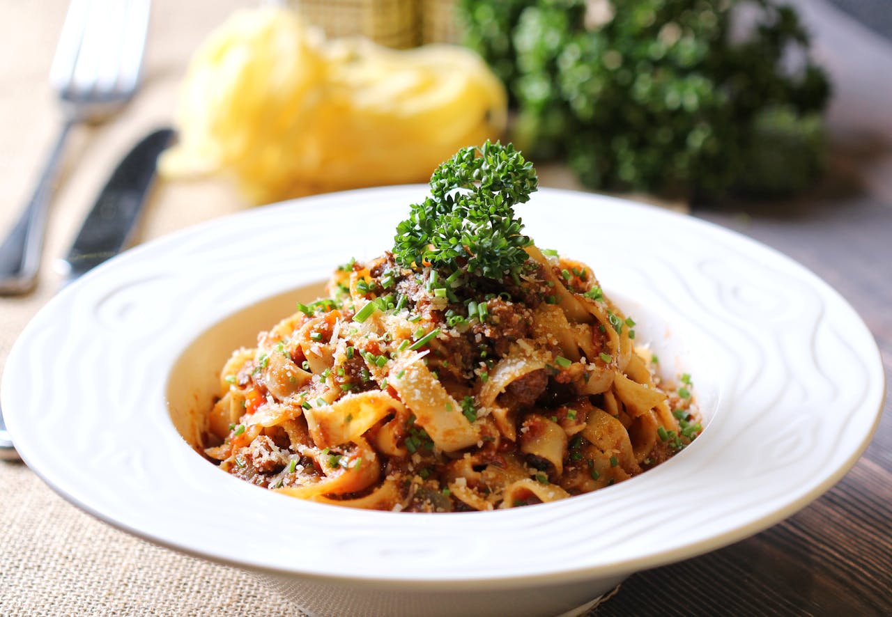 Mouth-watering pasta with rich sauce and fresh parsley garnish
